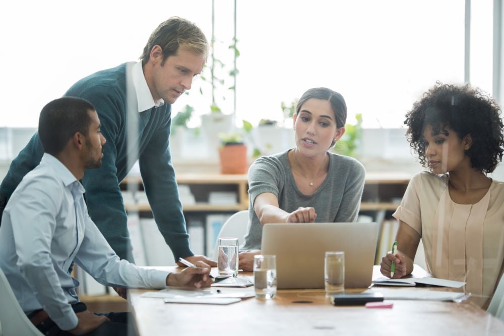 workers collaborating in a conference room