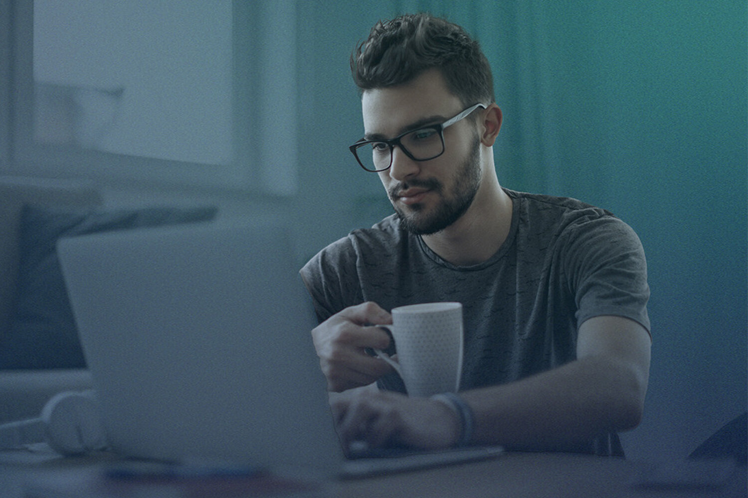 man working with laptop