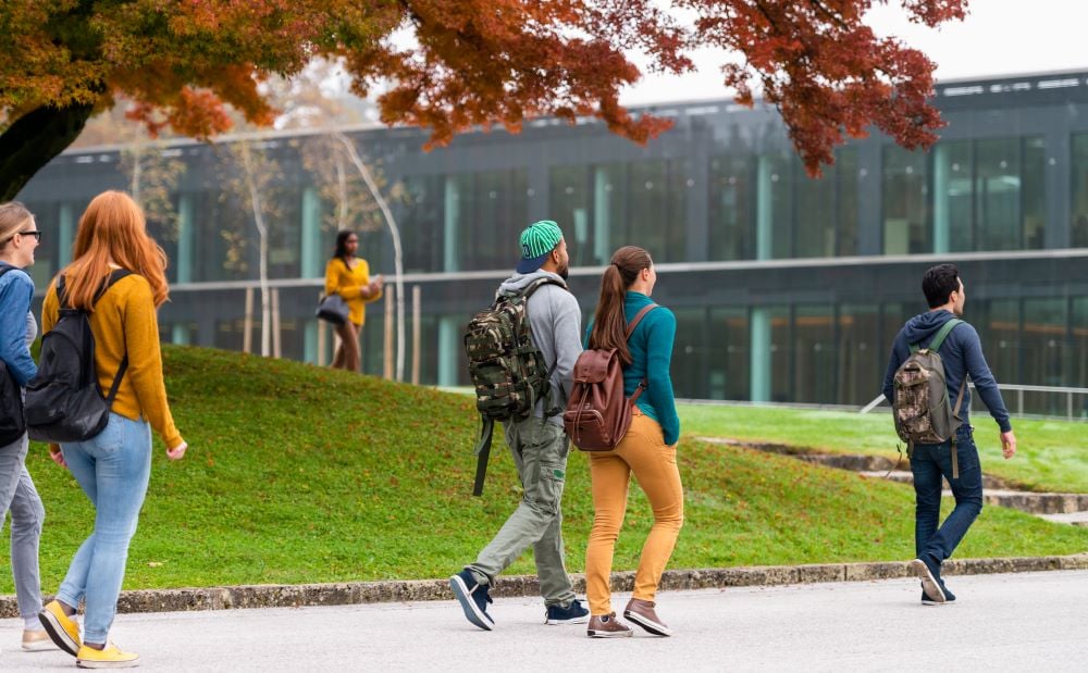 students walking on campus